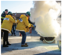 CERT members learning to put out a fire
